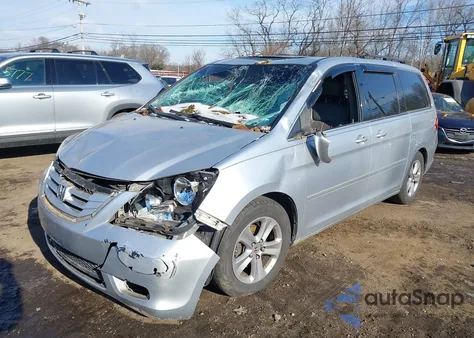 2010 Honda Odyssey Touring from USA, damaged, VIN 5FNRL3H90AB054663